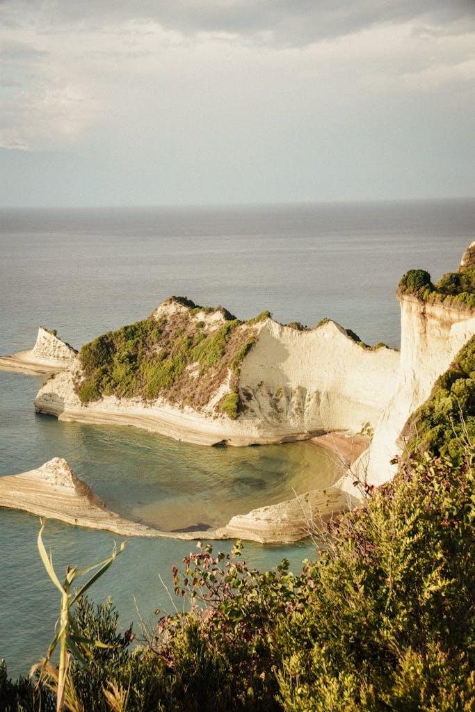 Stunning view of cliffs and sea in Corfu, Greece, captured in a serene landscape setting.