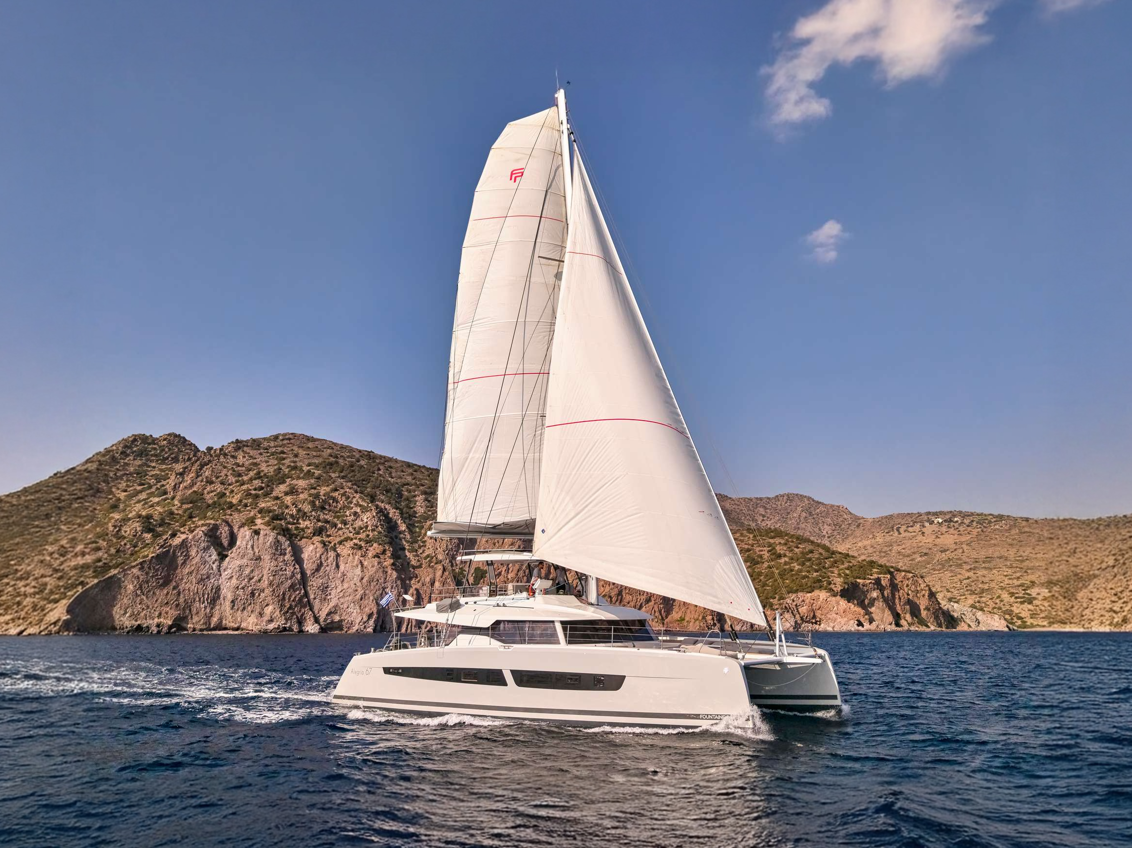 STEPHANIE luxury sailing catamaran cruising off the Greek coastline